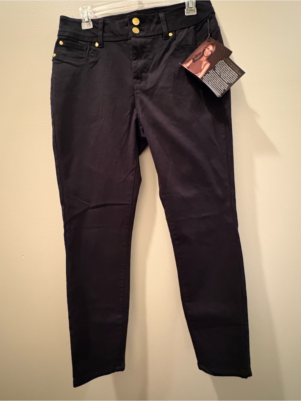IMAN Women's Black Skinny Jeans with Gold Hardware